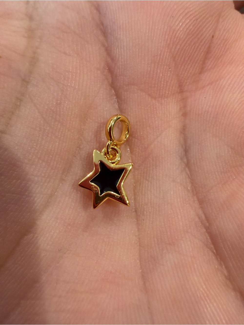 Kohl's Gold-Tone Star Pendant with Black Enamel Center